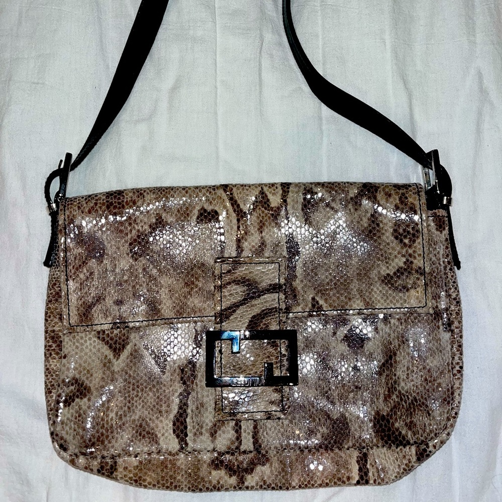 Original (Made in Italy) Cecconi brown snake print handbag with black strap.